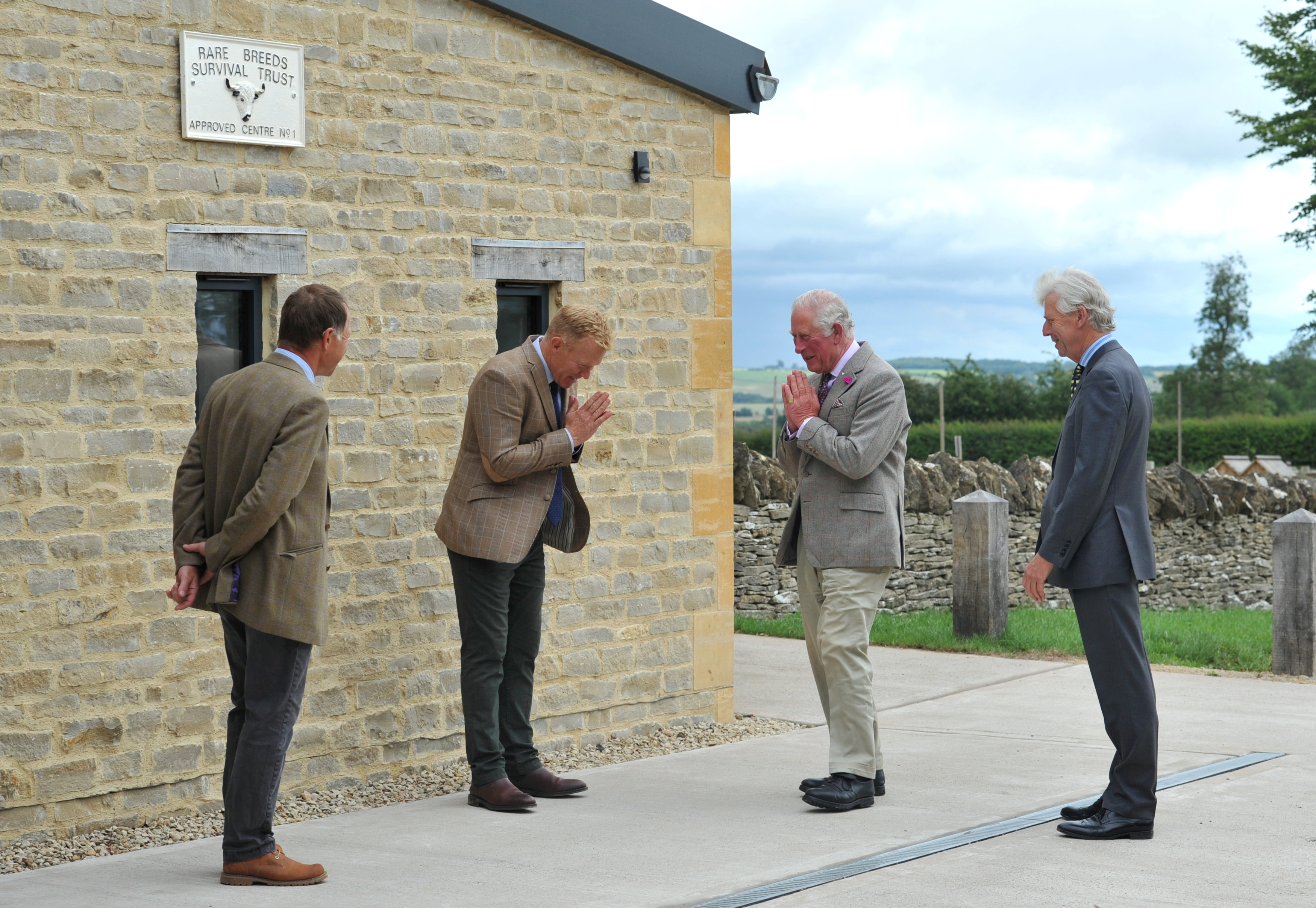 Prince of Wales greets Adam Henson at Cotswold Farm Park