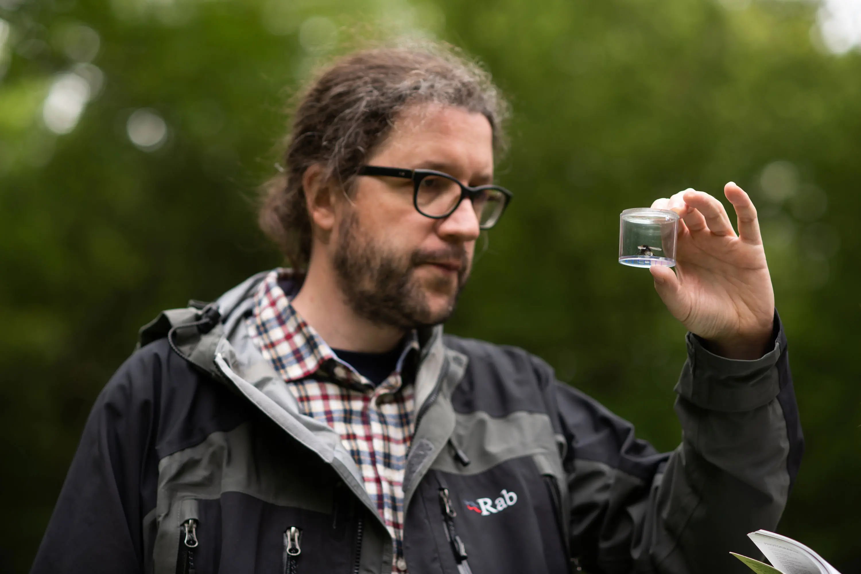 The Prince of Wales’s Charitable Fund Fellow Dr Matthias Becher holding a tiny pollinator tracker ‘backpack’. Photographer: John Cairns