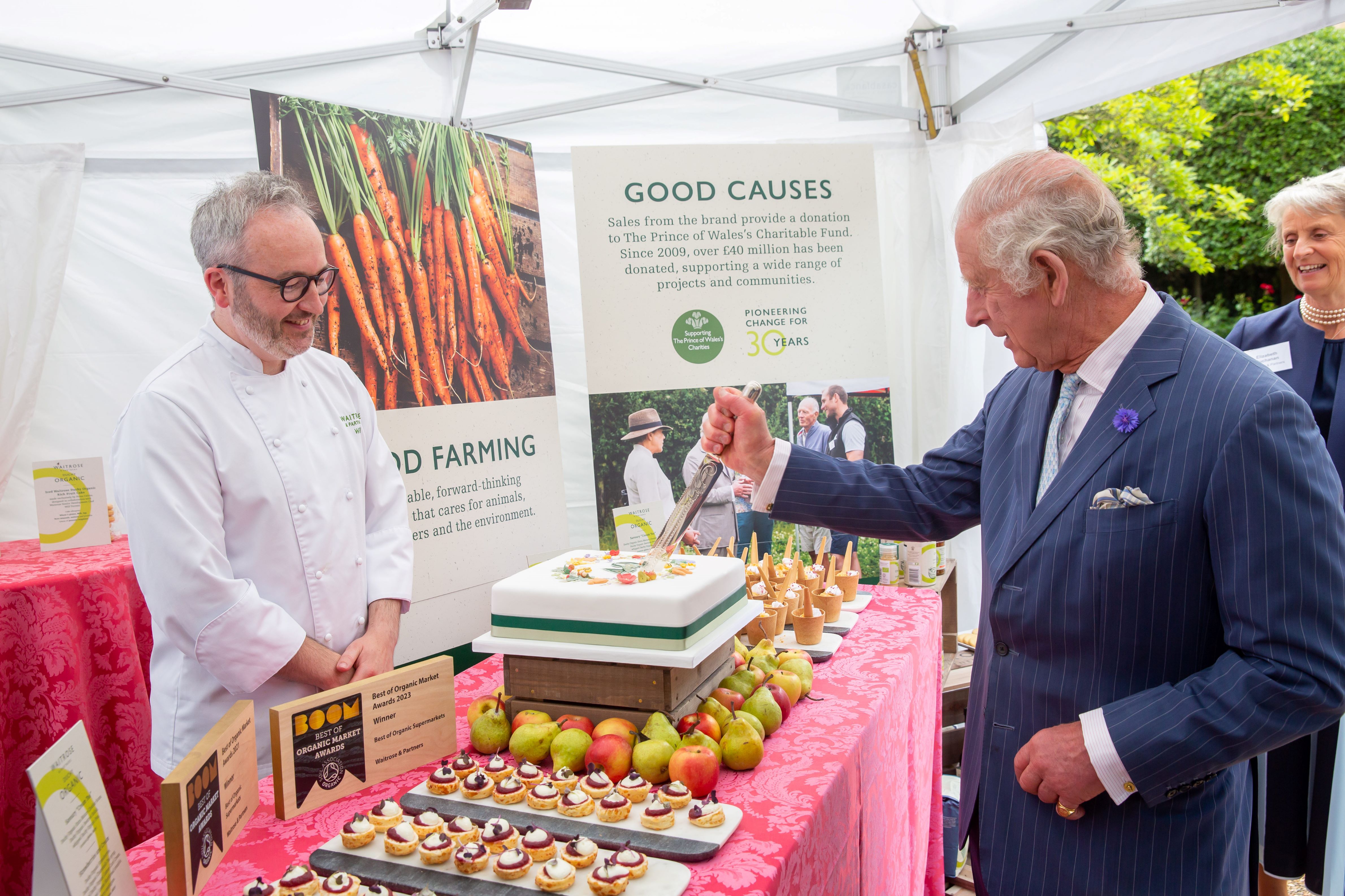 Chef, Will Torrent, presents His Majesty with a cake celebrating 40 years of his Charitable Fund