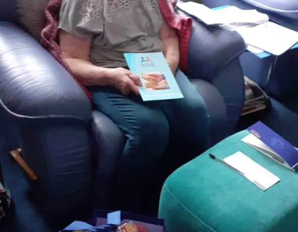 A service user with her food parcel