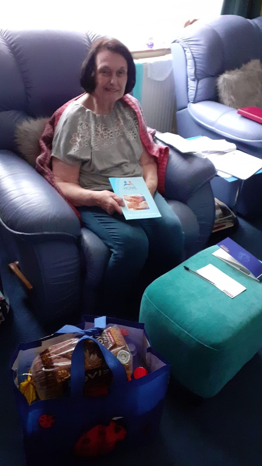 A service user with her food parcel
