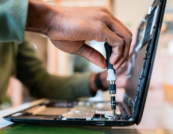 Laptop being repaired.